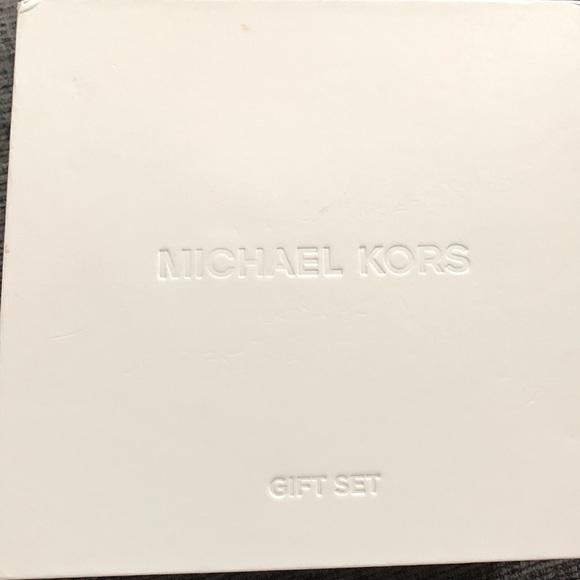 Michael Kors watch it comes with two bands and two chargers. - Picture 3 of 5